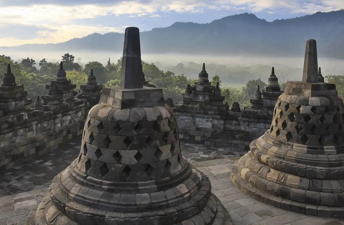 Stupas on the upper terrace of Borobudur at dawn
